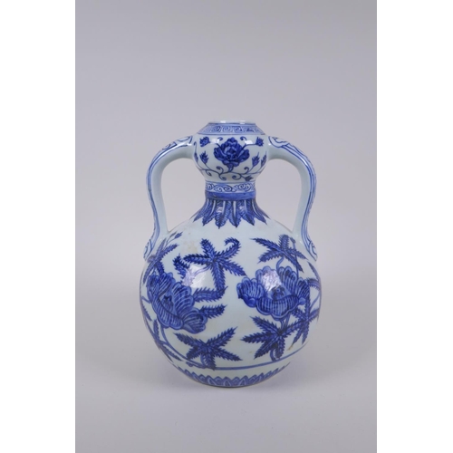 170 - A blue and white porcelain two handled garlic head shaped vase with floral decoration, Chinese Xuand... 