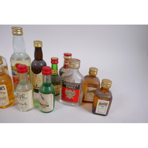 174 - A quantity of 70s and 80s spirits miniatures, mostly whisky including The Original Hundred Pipers 70... 