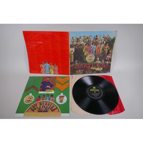 18 - Four original Beatles vinyl albums including two first pressings of Sgt Pepper's Lonely Hearts Club ... 