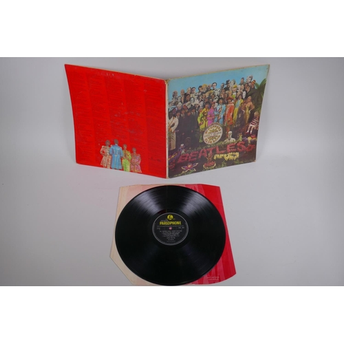 18 - Four original Beatles vinyl albums including two first pressings of Sgt Pepper's Lonely Hearts Club ... 