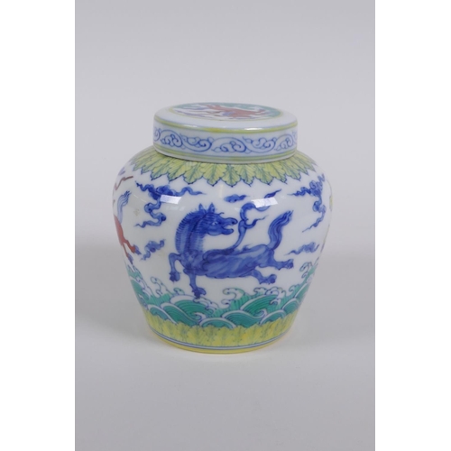 183 - A Chinese Wucai porcelain ginger jar and cover, decorated with mythical creatures, character mark to... 