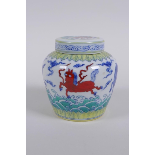 183 - A Chinese Wucai porcelain ginger jar and cover, decorated with mythical creatures, character mark to... 