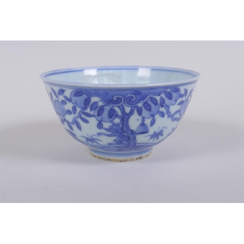 196 - A blue and white porcelain rice bowl decorated with animals and a peach tree, Chinese Jia Jing 6 cha... 