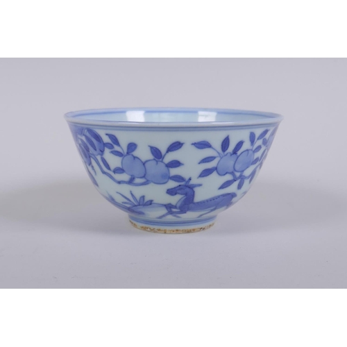 196 - A blue and white porcelain rice bowl decorated with animals and a peach tree, Chinese Jia Jing 6 cha... 