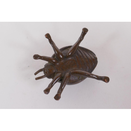 206 - A Japanese style bronze okimono ladybird, 3cm