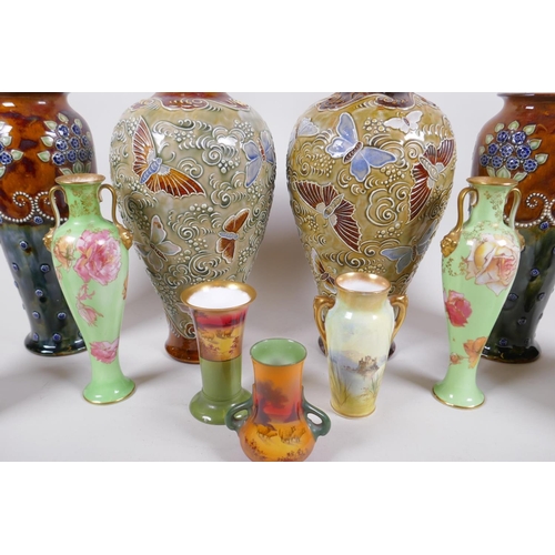 209 - A pair of Doulton Lambeth butterfly vases, a quantity of Royal Doulton stoneware and porcelain vases... 