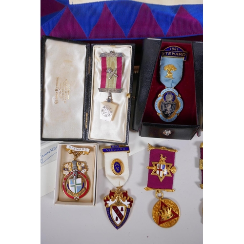 212 - A collection of Masonic regalia to include an apron, sash, assorted medals (some silver) and a quant... 