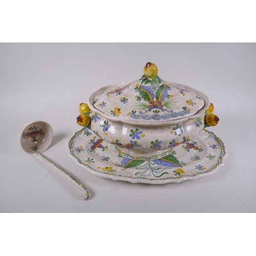 214 - A collection of Italian Majolica to include a vinegar bottle, bramble wine jug, a tureen with cover ... 