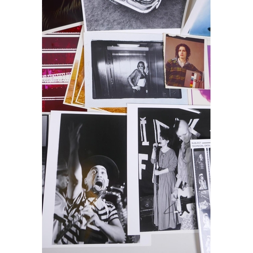 217 - A quantity of art, music and glamour photographs and contact sheets