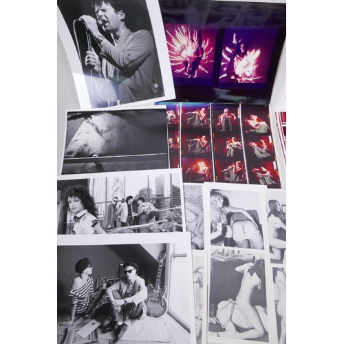 217 - A quantity of art, music and glamour photographs and contact sheets