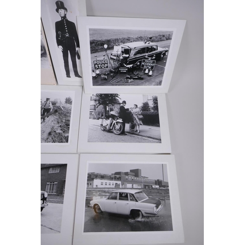 219 - A quantity of black and white photographs relating to policing, largest 29 x 17cm