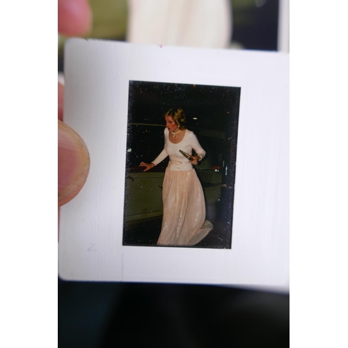 223 - A set of ten photographic slides depicting Princess Diana and a set of accompanying photographs, 10 ... 