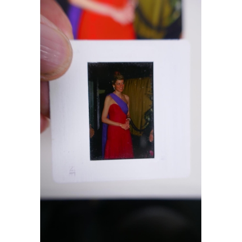 223 - A set of ten photographic slides depicting Princess Diana and a set of accompanying photographs, 10 ... 