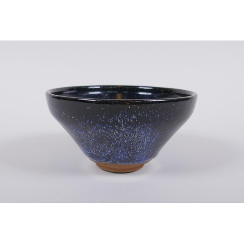 226 - A Chinese Jian kiln treacle glaze bowl with flambe detail, 13cm diameter