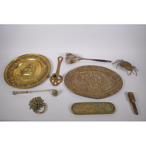 227 - A collection of C19th and C20th brass items, including a pen tray, alms dishes, candle snuffer, nut ... 