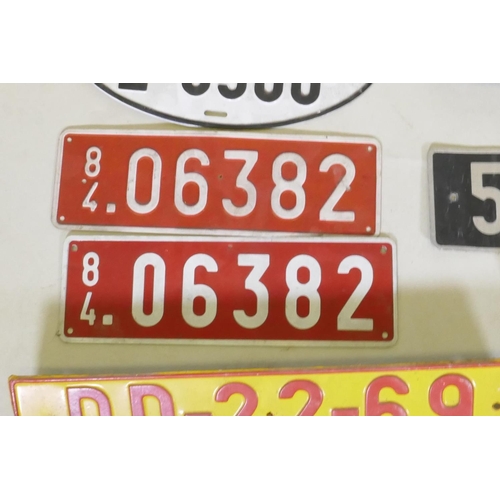 23 - A quantity of car number/licence plates