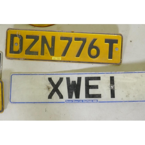 23 - A quantity of car number/licence plates
