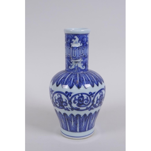 233 - A Chinese blue and white porcelain vase with two lug handles and scrolling floral decoration, Xuande... 