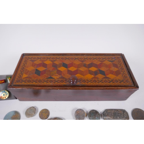 254 - An antique parquetry inlaid box, containing a quantity of dectorist finds including coins, brooches,... 