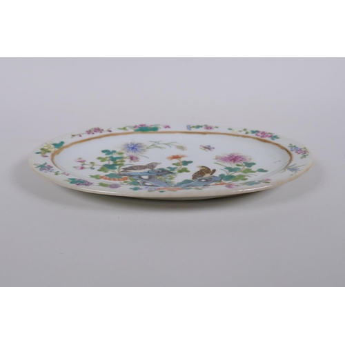 256 - A polychrome porcelain oval dish decorated with birds amongst flowers, Chinese GuangXu 6 character m... 