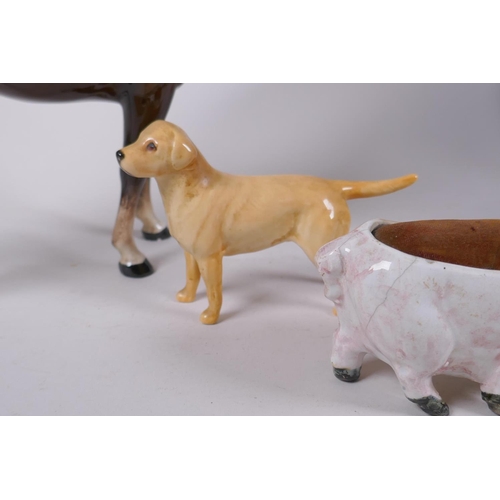 257 - A Beswick horse and Labrador, and a pottery pig pin cushion, and a Fieldings Lustreware footed bowl,... 