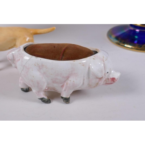 257 - A Beswick horse and Labrador, and a pottery pig pin cushion, and a Fieldings Lustreware footed bowl,... 