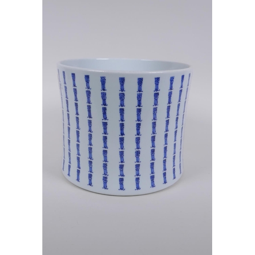 270 - A Chinese blue and white porcelain brush pot with allover character decoration, 17cm high, 20cm diam... 