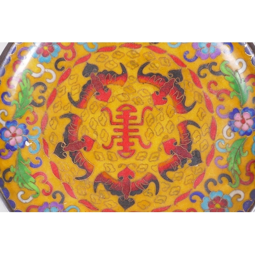 275 - A Chinese cloisonne dish decorated with bats, flowers and auspicious symbols, 20cm diameter