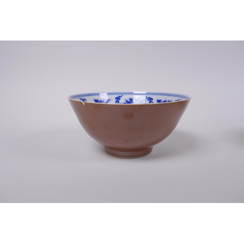 283 - A Chinese blue and white rice bowl decorated with boys flying kites, and a copper glazed rice bowl w... 