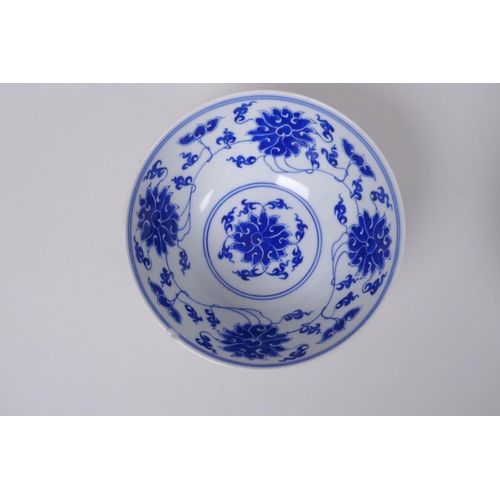 283 - A Chinese blue and white rice bowl decorated with boys flying kites, and a copper glazed rice bowl w... 