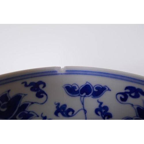 283 - A Chinese blue and white rice bowl decorated with boys flying kites, and a copper glazed rice bowl w... 