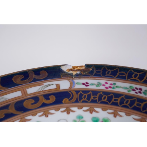 285 - A late C19th/early C20th Chinese export ware punch bowl, the interior decorated with famille rose en... 