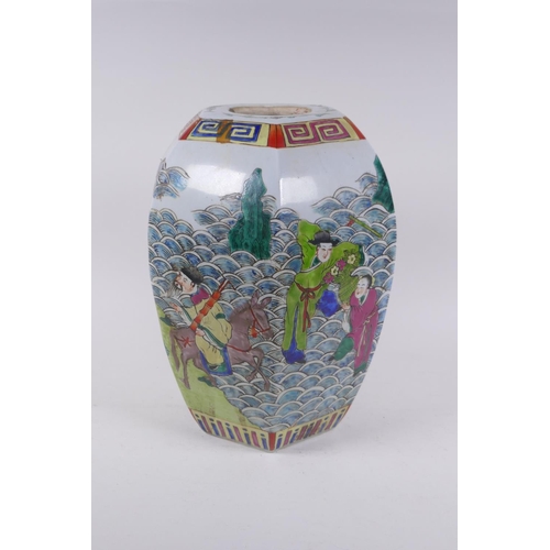 291 - A Chinese polychrome porcelain vase of hexagonal form, decorated with the eight immortals, 31cm high