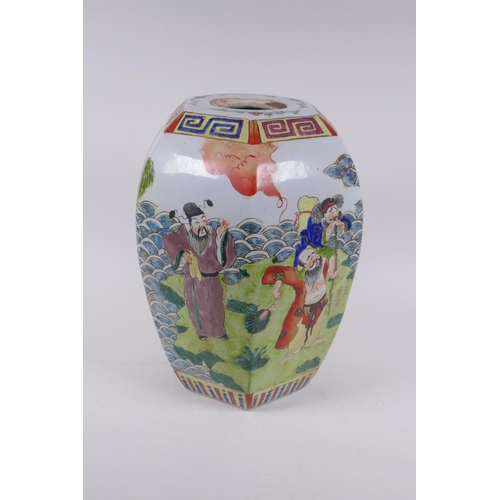 291 - A Chinese polychrome porcelain vase of hexagonal form, decorated with the eight immortals, 31cm high