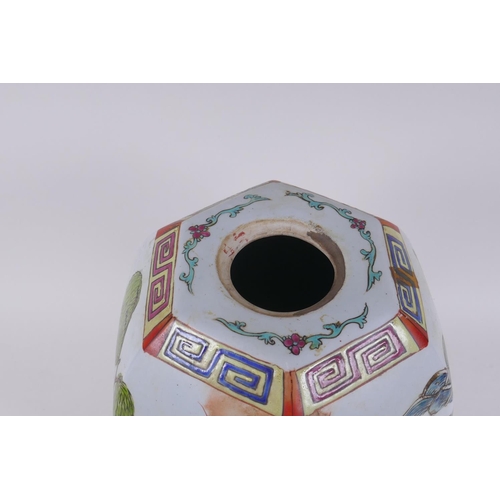 291 - A Chinese polychrome porcelain vase of hexagonal form, decorated with the eight immortals, 31cm high