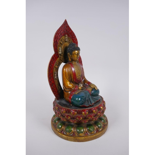 298 - A Chinese cold painted filled bronze figure of Buddha seated on a lotus throne, 4 character mark to ... 