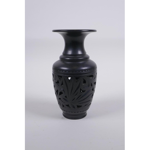 317 - A Chinese black ground YiXing reticulated vase, impressed marks to base, 15cm high