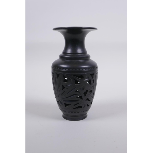 317 - A Chinese black ground YiXing reticulated vase, impressed marks to base, 15cm high