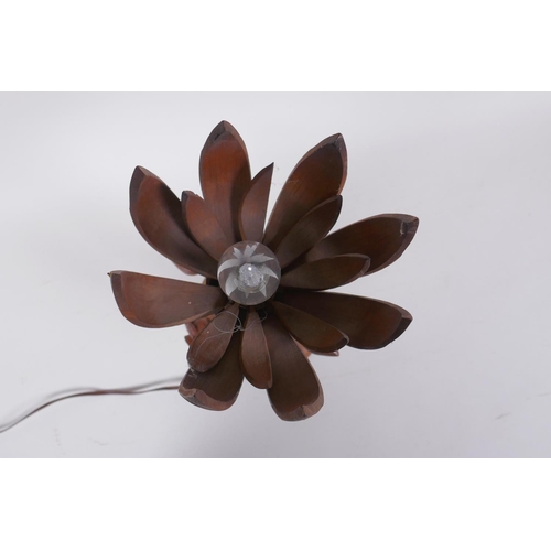 324 - A carved wood lotus flower table lamp, the petals opening to reveal the bulb, 35cm high