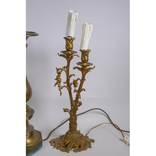 327 - An ormolu fluted column table lamp, a gilt metal table lamp in the form of an urn, a gilt metal figu... 