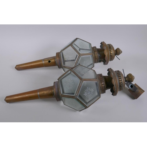 41 - A pair of antique brass and glass polyhedral wall lanterns, 52cm long