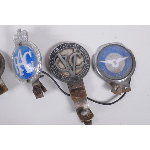 42 - Two pairs of vintage Stadium motorcycle goggles and another similar pair, all early to mid C20th, an... 