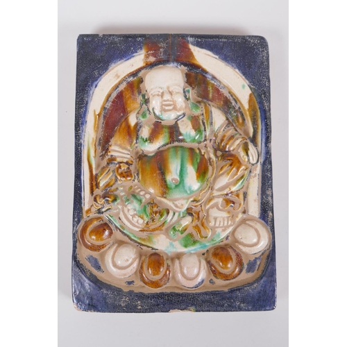 45 - A Chinese Sancai glazed porcelain tile with raised Buddha decoration, 18 x 25cm