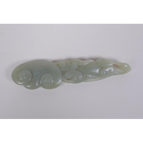 58 - A Chinese celadon jade pendant carved in the form of a phoenix and ruyi, and another carved in the f... 
