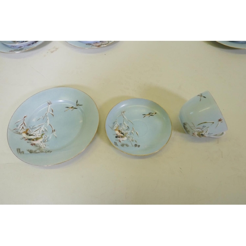 62 - A Japanese Meiji period hand painted eggshell porcelain part tea service, comprising a tea pot, milk... 