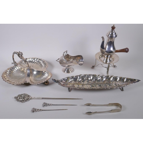 623 - A quantity of silver plate including a coffee pot and stand, skewers, coal scuttle shaped condiment ... 