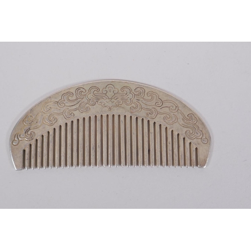 625 - A Chinese white metal hairpin and similar white metal comb, 18cm long