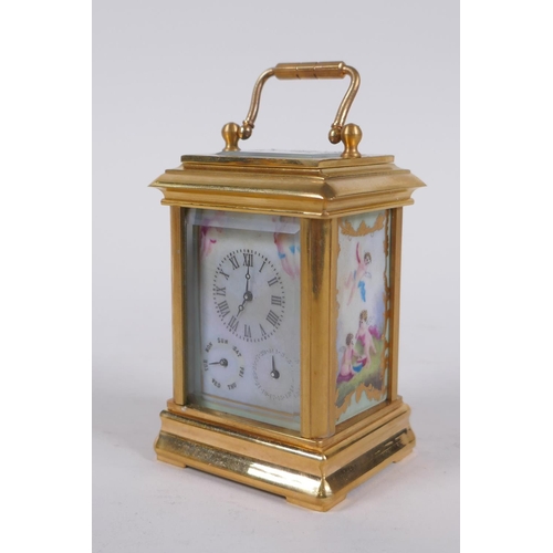 629 - An ormolu and Sevres style porcelain carriage clock with day and date subsidiary dials, 8cm high