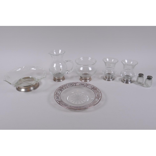 630 - A collection of silver and white metal mounted glass vases and dishes, largest 16cm diameter