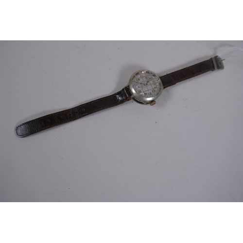 631 - A WWI trench watch, with illuminated Arabic numerals on a shaped white dial with subsidiary second d... 